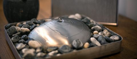 Brunnen aus Kieselsteinen